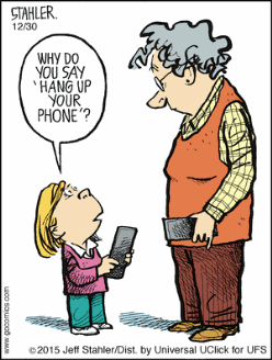 [vignetta con bambina e nonna, ciascuna con in mano uno smartphone]  bambina alla nonna: WHY DO YOU SAY ‘HANG UP YOUR PHONE’? 